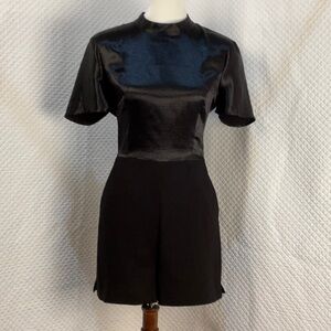 BCBGeneration black dressy romper open back Size 10